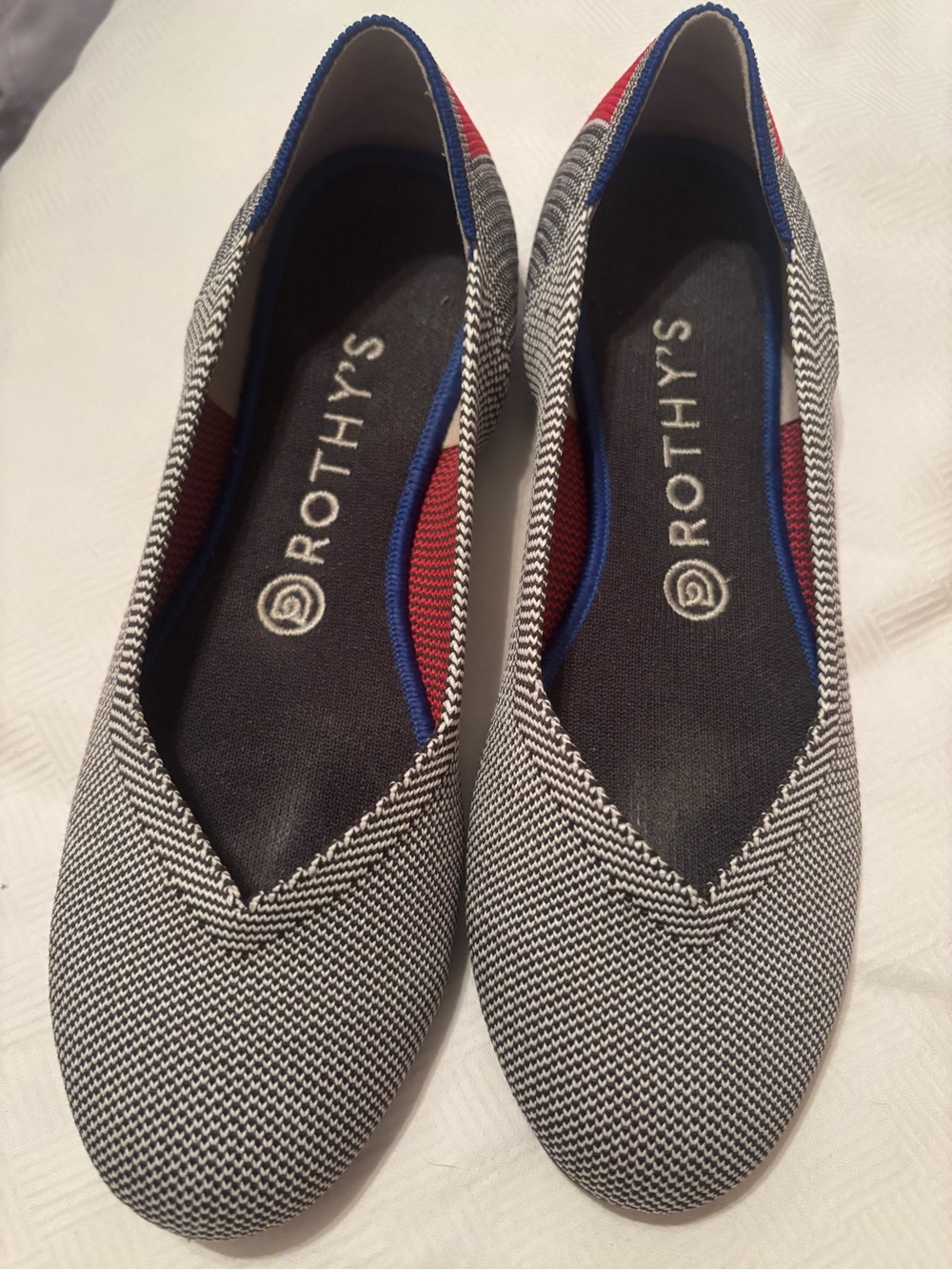 Rothy's Black & White Knit V-Neck Flats with Red and Blue Trim